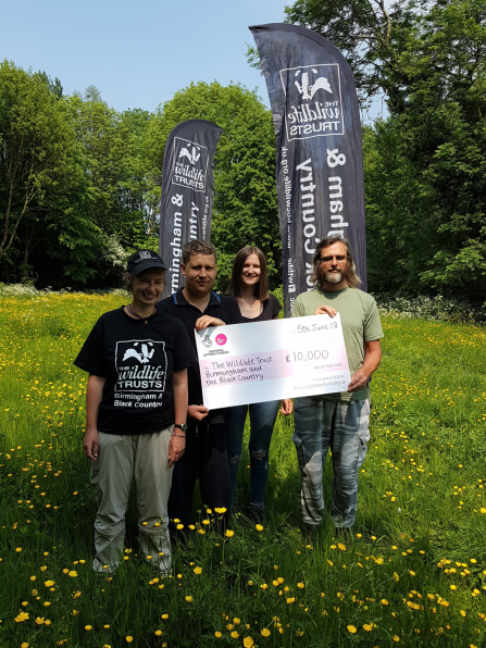 Reserve Officer Alison Wilkes and Friends of Peascroft Wood receiving their Awards for All grant